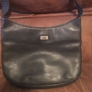 SAK solid leather bag
